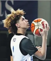  ?? Petras Malukas AFP/Getty Images ?? LaMELO BALL, playing overseas instead of in college, is the kind of player the league aims to attract.