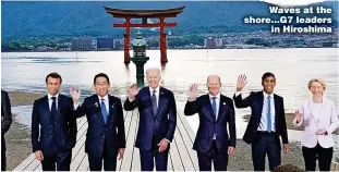  ?? ?? Waves at the shore...G7 leaders in Hiroshima