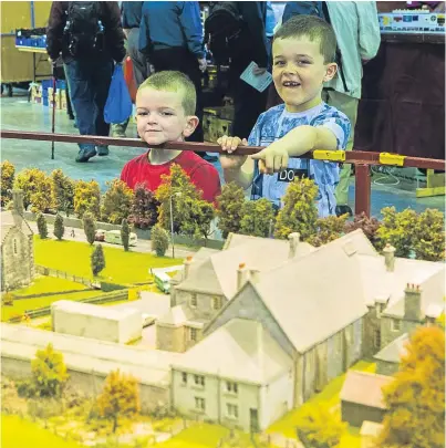  ?? Picture: Steven Brown. ?? Conlan Turner, 5, and his brother Bryn, 6, admire the Blair Atholl display.