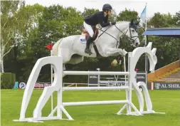  ??  ?? “She should make a grand prix horse” – the Nick Skelton-owned Billy Bilboa, ridden by Lottie Tutt, proves best of the five-year-olds