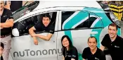  ??  ?? The world's first self-driving taxis have begun picking up passengers in Singapore: The nuTonomy team with one of their driverless cars. Pic nuTonomy
