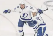  ??  ?? Jason franson / the Canadian Press via AP tampa Bay left wing Yanni Gourde, right, celebrates his goal against dallas with ondrej Palat during the second period of Game 4 of the Stanley Cup final on friday. Game 5 of the series is Saturday.