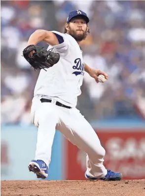  ??  ?? Dodgers pitcher Clayton Kershaw pitches against the Red Sox in Game 5 of the World Series on Sunday.