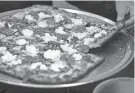  ?? DOUG HOOD/APP ?? A Station 83 pie from The Galley Pizza & Eatery in Asbury Park.