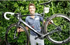  ?? — AFP photo ?? Thibaut Pinot poses with his bicycle during an interview in Salamanca.