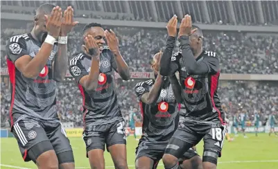  ?? BackpagePi­x | ?? PATRICK Maswangany­i (second from left) celebrates one of his two goals for Orlando Pirates against AmaZulu last week, and will hope for a repeat tomorrow.