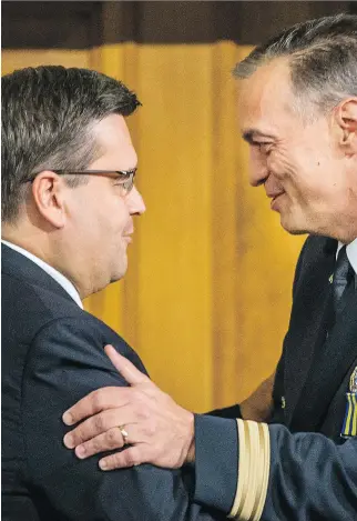  ?? DARIO AYALA ?? Montreal Mayor Denis Coderre, left, has welcomed a report on dealing with corruption in the city’s police force from Chief Philippe Pichet, right. Details of the report will be released Friday but Coderre says change partly depends on getting rid of...