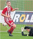  ?? ?? Formartine’s Ryan Spink scores to make it 2-0 against Turriff