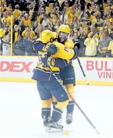  ?? FREDERICK BREEDON/GETTY IMAGES ?? P.K. Subban (right) and Vernon Fiddler of the Nashville Predators celebrate after they scored during the third period against the Anaheim Ducks in Game six of the Western Conference Final.