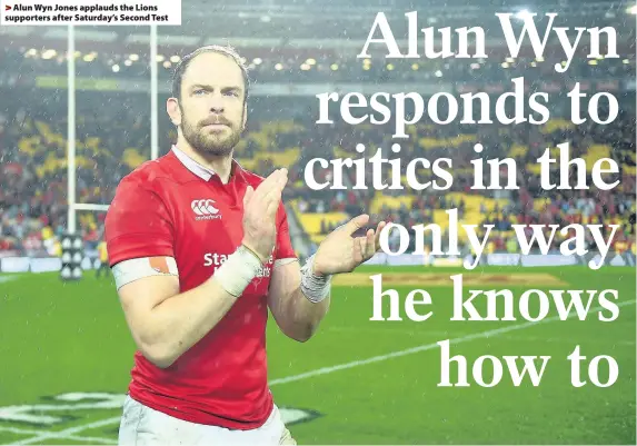  ??  ?? > Alun Wyn Jones applauds the Lions supporters after Saturday’s Second Test