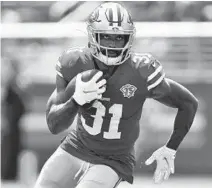  ?? JED JACOBSOHN/AP ?? Raheem Mostert, shown with the San Francisco 49ers, during a 2021 preseason game vs. Las Vegas in Santa Clara, California.