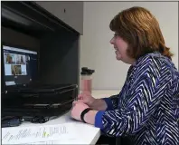  ?? (Arkansas Democrat-Gazette/Stephen Swofford) ?? Kathy Pillow-Price, project manager for Promoting Positive Emotions (Stay Positive Arkansas), gets ready to moderate an online event from her office on Friday.