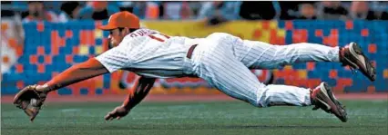  ?? GEORGE WIDMAN/AP ?? Scott Rolen won eight Gold Glove Awards at third base for the Philadelph­ia Phillies, St. Louis Cardinals and Cincinnati Reds.