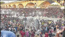  ?? PTI ?? Devotees in large numbers take part in a procession on the occasion of Chithirai festival in Madurai on Saturday.