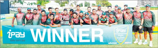  ??  ?? The Bangladesh team pose for a photo at the end of the 3rd and final ODI match between the West Indies and Bangladesh at Warner Park, Basseterre, St Kitts on July 28. (AFP)