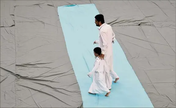  ?? Skip Dickstein / Times Union archive ?? Worshipers celebrate Eidul Adha, which follows the completion of hajj, pilgrimage to holy sites in and around Mecca in Saudi Arabia, at the Islamic Center of the Capital District on Sept. 12, 2016 in Colonie.