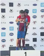  ??  ?? Fundraiser
Lynsay Whyte and son Struan from Muthill after the half marathon. Lynsay is also taking part in the Edinburgh Marathon Festival this weekend to raise funds for MacRosty Park’s all abilities swings