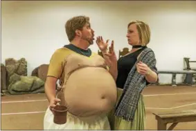  ?? PHOTO PROVIDED ?? Craig Colclough rehearses in his “fat-suit” for the title role of Falstaff at Opera Saratoga with Lindsay Ammann.