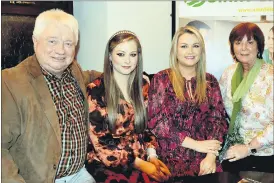  ?? (Pic: P O’Dwyer) ?? LEFT: Joe O’Brien, Sinn Féin candidate in the upcoming local elections in June, pictured with his daughters, Sorcha and Aoife and his wife, Rita, at his campaign launch in O’Donnell’s Bar, Glanworth last Saturday night.