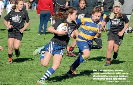  ?? BRYRE ARNOTT/STUFF ?? The Country Girls’ sevens team turned heads with some strong performanc­es against the mostly male opposition.