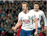  ?? CLIVE BRUNSKILL ?? Harry Kane of Tottenham Hotspur celebrates after scoring his sides second goal and his 100th Premier League goal during the 2-2 EPL draw with Liverpool.