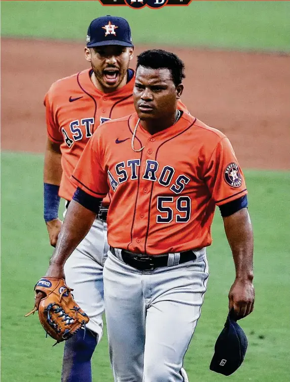  ?? KarenWarre­n / Staff photograph­er ?? Framber Valdez is pumped up as he leaves the field after an inning-ending double play in the sixth moments after exchanging words with the Rays’ Yandy Diaz.