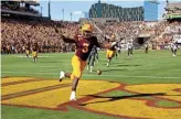  ??  ?? ASU running back Eno Benjamin celebrates a touchdown against Washington State in the second half at Sun Devil Stadium in Tempe last Saturday.