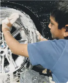  ??  ?? Get your kid to clean the car (photo: Ali Saadi/Getty Images)