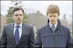  ?? CLAIRE FOLGER / ROADSIDE ATTRACTION­S VIA AP ?? Casey Affleck, left, and Lucas Hedges appear in “Manchester By The Sea.”