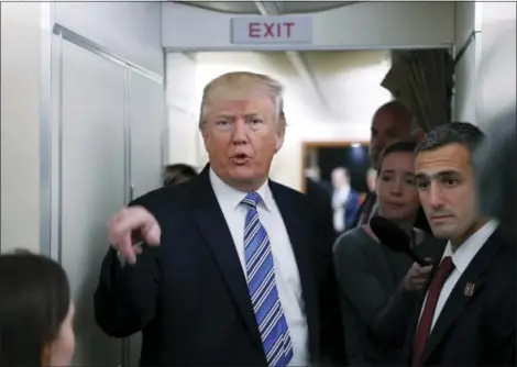  ?? PABLO MARTINEZ MONSIVAIS- THE ASSOCIATED PRESS ?? President Donald Trump speaks to members of the media aboard Air Force One before his departure from Andrews Air Force Base, Md., Saturday,