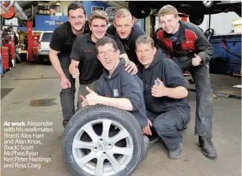  ??  ?? At work Alexander with his workmates (front) Alex Hart and Alan Knox, (back) Scott McPhee,Ryan Kerr,Peter Hastings and Ross Craig