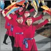  ?? [DOUG HOKE/ THE OKLAHOMAN ARCHIVES] ?? Members of the Confucius Institute at the University of Oklahoma perform a folk dance Feb. 16, 2018, on the Water Stage during the Lunar New Year celebratio­n at the Myriad Botanical Gardens.