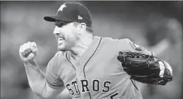  ?? VAUGHN RIDLEY/GETTY ?? Astros ace Justin Verlander celebrates after the final out of his no-hitter Sunday.