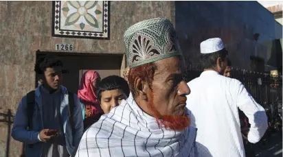  ?? (Illustrati­ve photo Stephanie Keith/Reuters) ?? WORSHIPERS GATHER outside the Masjid At-Taqwa Mosque in Brooklyn in 2015.