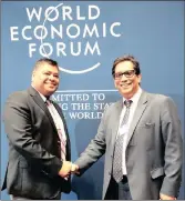  ?? PICTURE: MOTSHWARI MOFOKENG ?? Independen­t Media Executive Chairman Dr Iqbal Survé, right, congratula­tes new POST Editor Krisendra Bisetty.