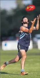  ??  ?? Tongala’s Benjamin Gledhill takes a nice mark in the game against Moama on the weekend. Picture: Luke Hemer.