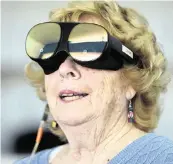  ?? LYNNE SLADKY AP | Jan. 31, 2024 ?? Karen Audet, who lives at John Knox Village in Pompano Beach, was so entranced by her virtual walk around Paris that she didn’t hear questions being asked of her.