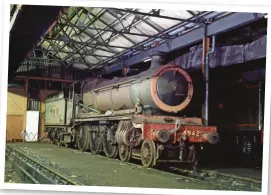  ?? ?? LEFT Still in ex-Barry condition and bearing its bufferbeam number, Maindy Hall sits in the shed at Didcot on October 27 1995, shortly prior its conversion into a ‘Saint’. MARK BURROWS