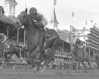  ?? DAVID J. PHILLIP/THE ASSOCIATED PRESS ?? After wins at the Kentucky Derby, left, and the Preakness Stakes, right, I’ll Have Another had a chance at becoming the first Triple Crown winner since 1978.