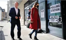  ?? Photograph: Tolga Akmen/AFP/Getty Images ?? Keir Starmer and his wife, Victoria, cast their votes in Kentish Town, London.