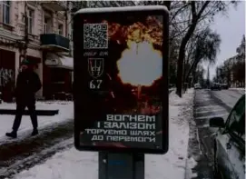  ?? BRENDAN HOFFMAN/NEW YORK TIMES ?? An advertisem­ent for the 67th Separate Mechanized Brigade was among ads that have become ubiquitous in Kyiv.