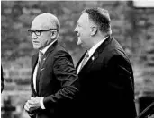  ?? MATT DUNHAM/AP ?? U.S. Ambassador Robert “Woody” Johnson, left, walks Tuesday with Secretary of State Mike Pompeo in London.