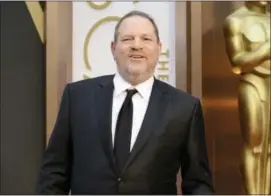  ?? PHOTO BY JORDAN STRAUSS — INVISION — AP, FILE ?? In this file photo, Harvey Weinstein arrives at the Oscars in Los Angeles.