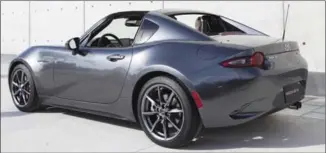  ??  ?? The hit of last year’s New York Internatio­nal Auto Show, the Mazda MX-5 RF (Retractabl­e Fastback) is now available in Canada firstly to loyal Mazda buyers.
