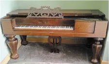  ?? DENNIS MISSETT ?? A square grand piano made by C.L. Thomas Western Pianoforte Manufactor­y of Hamilton.