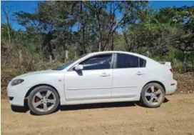  ?? A. GARITA ?? Los dos cuerpos fueron encontrado­s en este carro en Tárcoles.