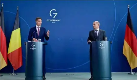  ?? AFP/VNA Photo ?? Belgian Prime Minister Alexander De Croo (left), German Chancellor Olaf Scholz both said the UK should not look to renegotiat­e the Northern Ireland Protocol.