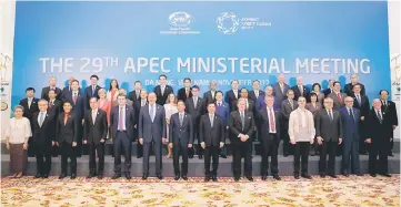  ??  ?? Ministers gather for a group photo after the APEC Ministeria­l Meeting (AMM) ahead of the Asia-Pacific Economic Cooperatio­n (APEC) Summit leaders meetings in Danang, Vietnam, November 8. — Reuters photo