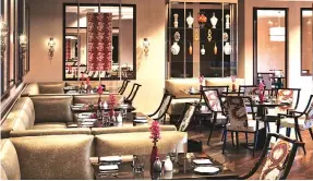  ??  ?? The rooftop bar, Cirrus9, has automatic wind sensors to protect guests from the heat and rain; Baoshuan serves Chinese cuisine at The Oberoi