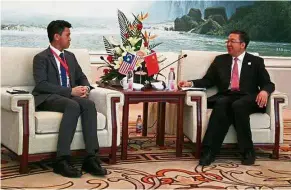  ??  ?? New energy: Chong (left) with China’s Vice-Education Minister Tian XueJun in Guizhou recently.